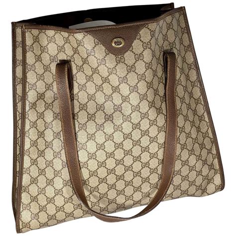 gucci gg 1933 brown|GG Emblem large shoulder bag in beige and dark brown canvas.